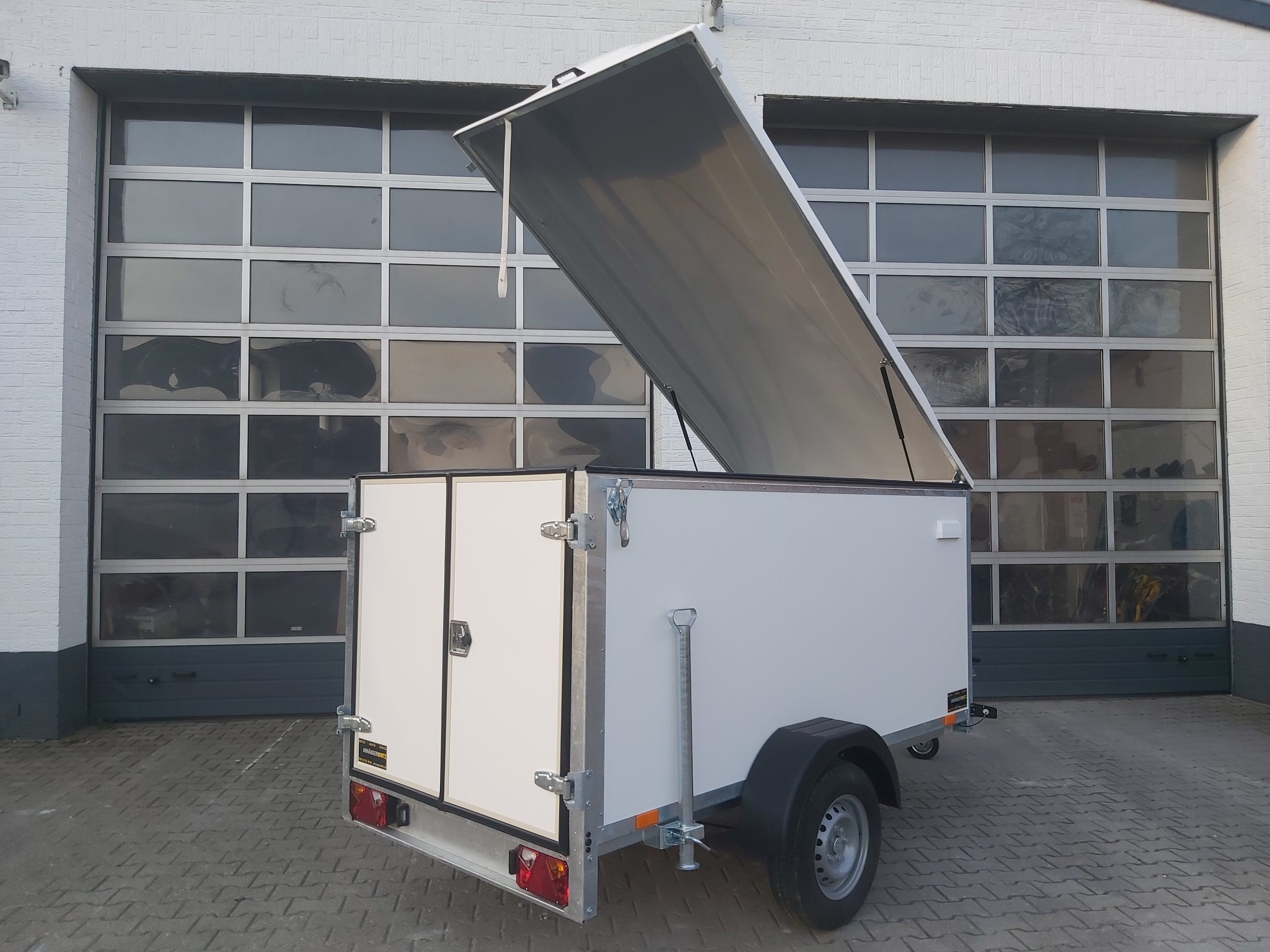 Kargo Deckel TFDL 250.00 245x130x140cm Hecktüren Stützen (S) 100km/H 1300kg