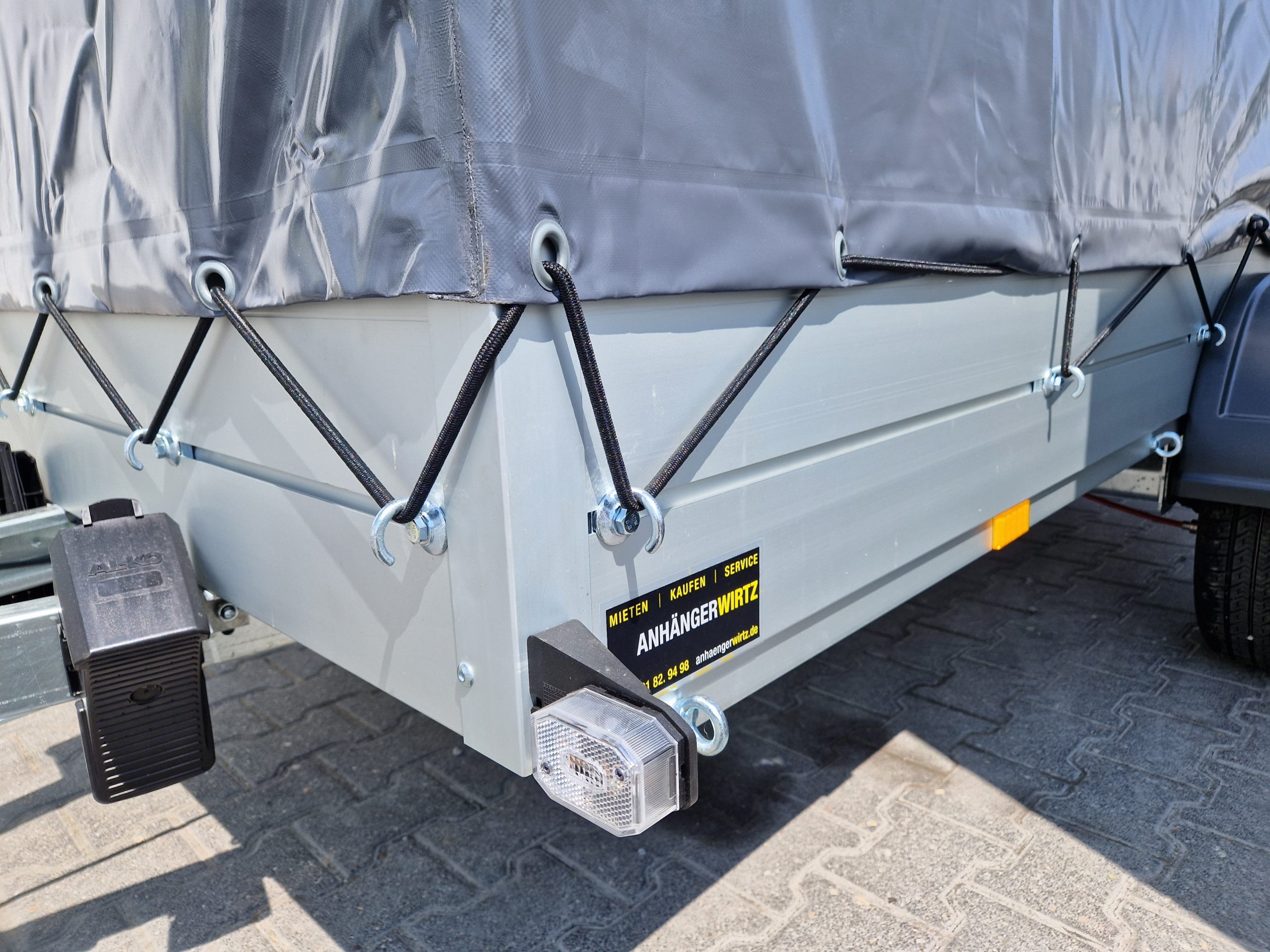 Aluliner Planen Anhänger GTB 1200 301x126x150cm +Hochplane grau schräg (M) 1200kg Aktion