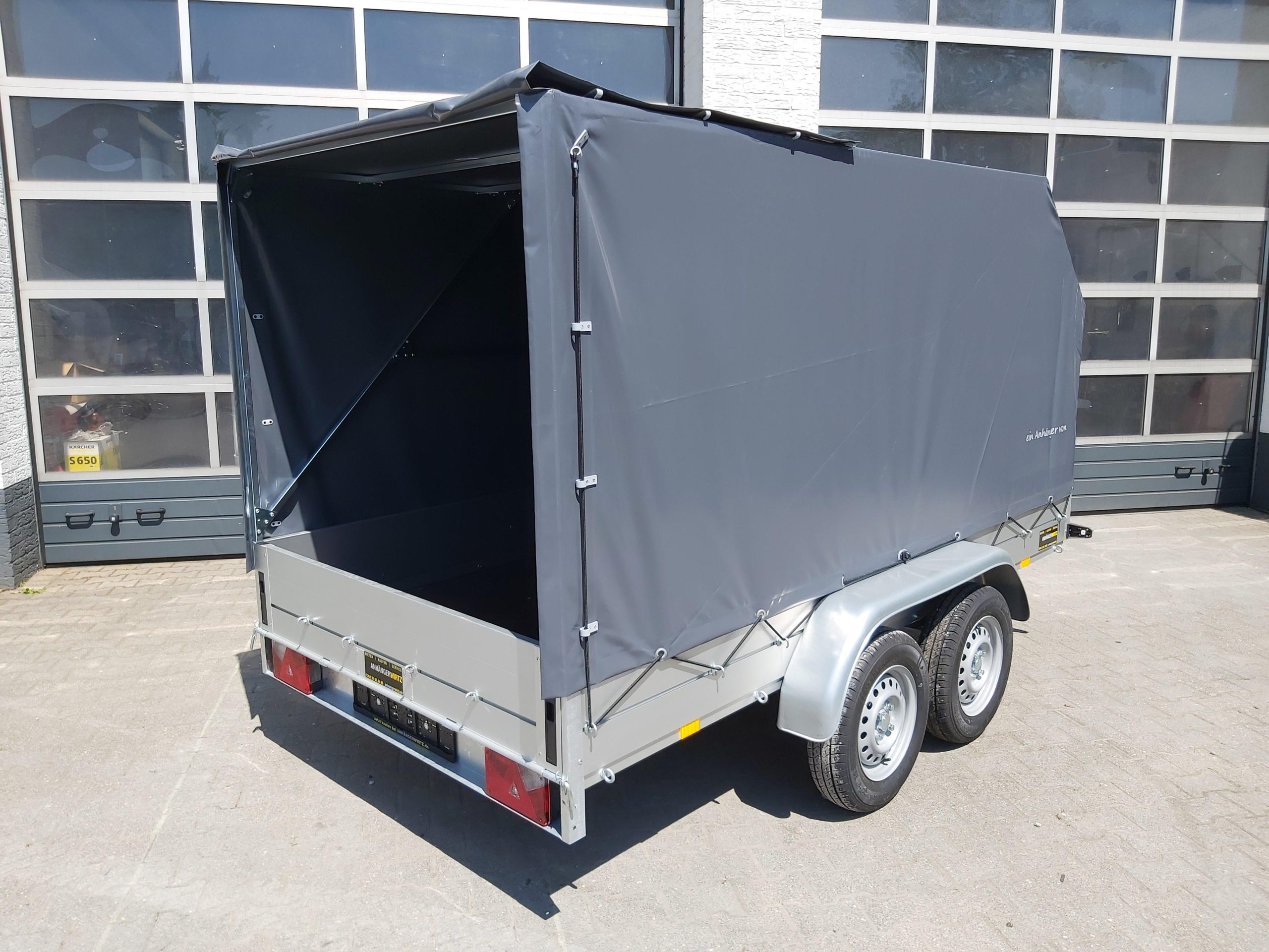 Aluliner Planen Anhänger GTT 2000 301x151x150cm Plane grau schräg (M) 2000kg Aktion